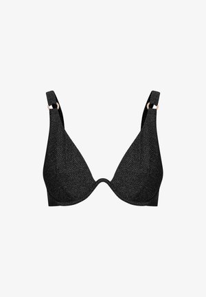 Czarny stanik z teksturowanej tkaniny, z głębokim dekoltem i szerokimi ramiączkami. Regulowane ramiączka mają metalowe akcenty dla wsparcia.