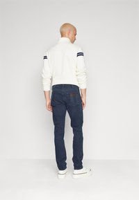 Wrangler LARSTON - Kavbojke slim fit - travis