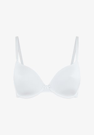 Vitt bh med släta, formade kupor, justerbara remmar och en central dekorativ knut. Tillverkad av ett mjukt, stretchigt material.
