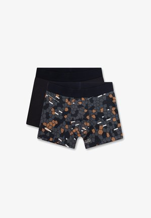 Two pairs of men's boxer shorts; one black and another with a geometric pattern in gray, terracotta, and white. Soft, stretchy fabric.