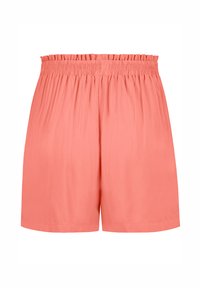 Coral-colored shorts with an elastic waistband, smooth texture, and a relaxed fit. They feature an untailored hem and no pockets.