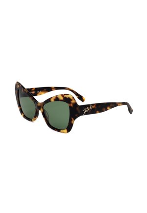 Occhiali da sole a occhio di gatto tartarugati con lenti verde scuro e logo firma dorato sull’asta destra.