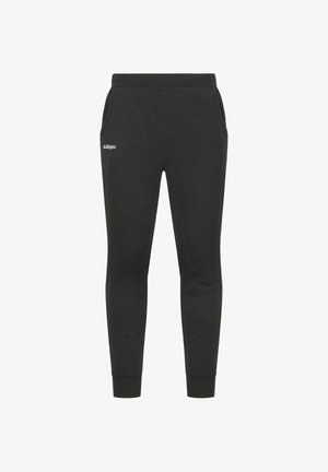 Pantaloni della tuta neri con vestibilità affusolata, vita elastica, tasche laterali e un piccolo logo bianco sull'anca. Il tessuto è morbido e liscio.