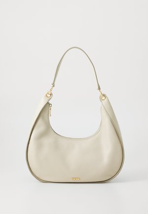 Light beige leather hobo bag with a smooth texture, a curved shape, a single strap, and gold-tone hardware with a logo accent.