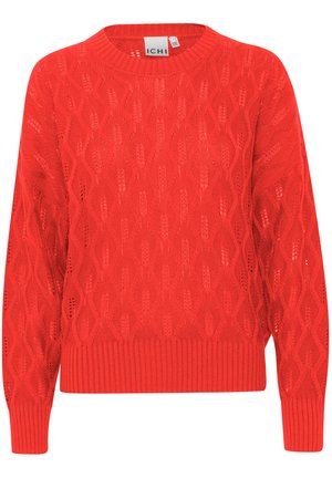 Raudonas megztinis su tekstūruotu raštu, kuriame yra išpjovų ir raukinio apdaila. Jis turi apvalią iškirptę ir ilgas rankoves.