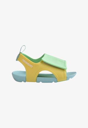 Sandalo per bambino a punta aperta con suola azzurro chiaro, lati gialli e cinturino verde regolabile sulla parte superiore, con inserto sul tallone.