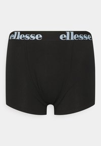 Svarta boxertrosor i mjuk bomull, med en ljusblå midjeband med "ellesse"-logotyp och en figurnära design. Slät textur.