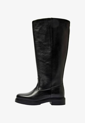 Tall black leather knee-high boot with low stacked heel and round toe, displayed on a white background.