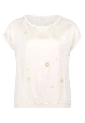Kremowa bluzka z krótkim rękawem, okrągłym dekoltem, elastycznym dołem oraz subtelnymi złotymi haftami kwiatowymi i muszelkowymi na przodzie.