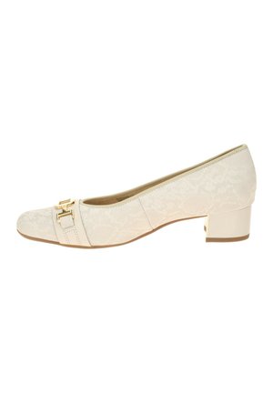 Beige low-heeled women's loafer with subtle pattern and gold decorative buckle on the front.