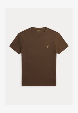 T-shirt marron à manches courtes col rond avec petit logo jaune Polo Ralph Lauren sur la poitrine gauche.