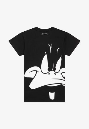 T-shirt in cotone nero con una grande grafica di faccia di paperocartoons bianca e con caratteristiche esagerate, tra cui un becco prominente e occhi grandi.