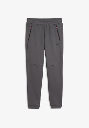 Donkergrijze slim-fit joggerbroek met elastische tailleband, zijzakken met rits en subtiel Puma-logo op de linker dij.