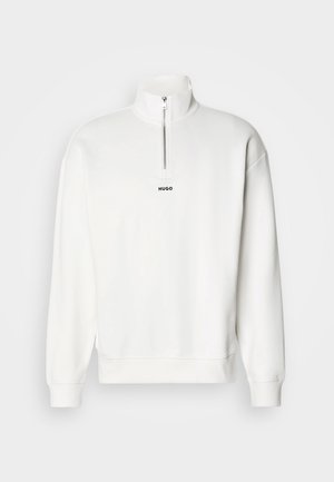 White pullover sweatshirt with a high collar and half-zip, featuring a small black "HUGO" logo centered on the chest. Soft fabric texture.