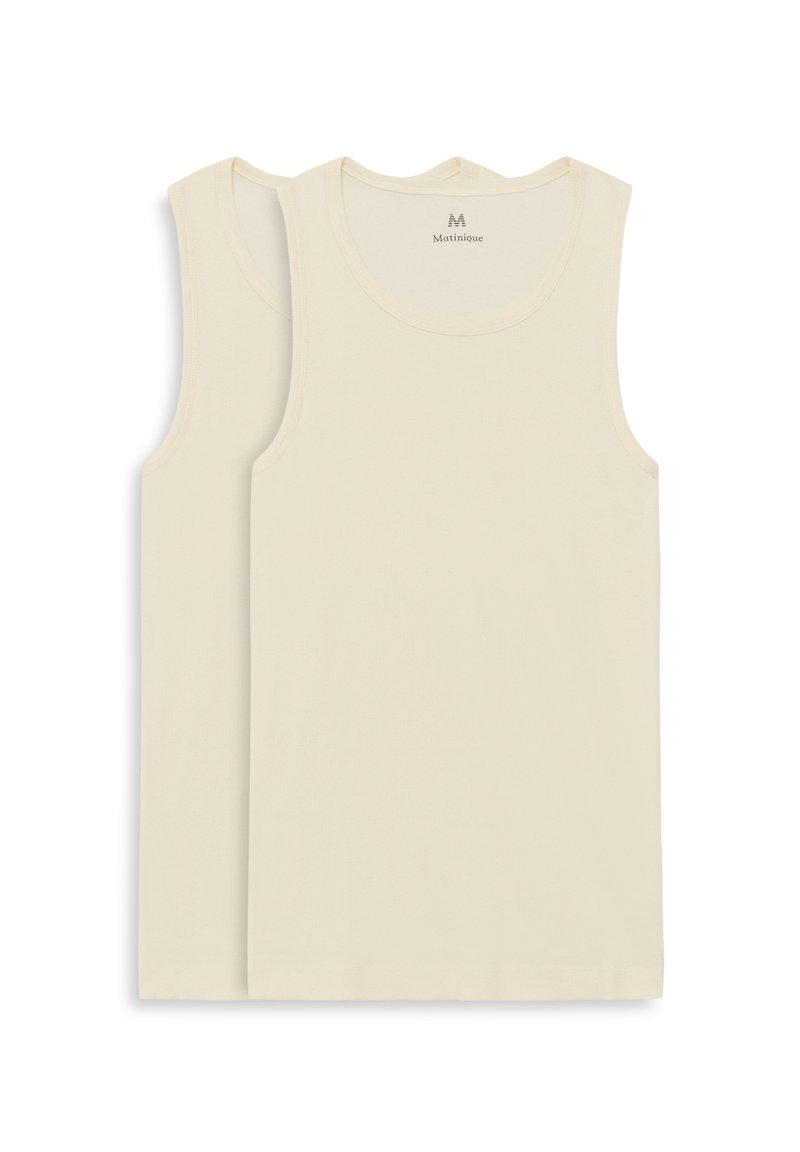 Bavlněná tílka krémové barvy s kulatým výstřihem a bez rukávů, s hladkou texturou a minimalistickým stylem.