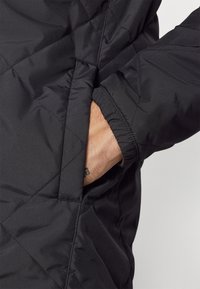 The North Face AFTERBURNER INSULATED - Jachetă outdoor - black/smokey brown