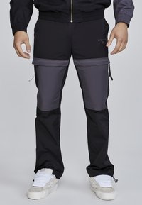 CUT AND SEW JOGGERS - Hlače - black