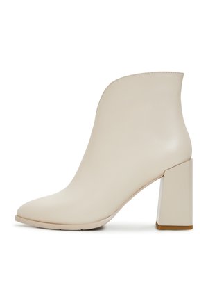 Stivaletti con tacco - beige