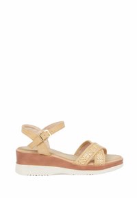 Sandalo wedge beige con cinghie incrociate. Presenta un accento intrecciato, una cinghia alla caviglia regolabile e una suola testurizzata per migliorare la presa.