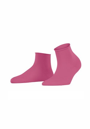 Roze enkelkousen gemaakt van een soepel, rekbaar materiaal met een geribde rand, en met een naadloze teenontwerp voor extra comfort.