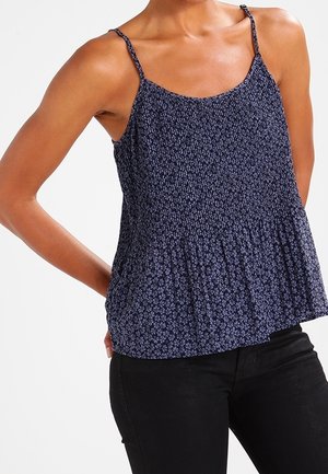 Marineblaues ärmelloses Oberteil mit floralem Muster und dünnen Trägern, mit gerafftem Oberteil und ausgestelltem Saum, aus leichtem Stoff gefertigt.
