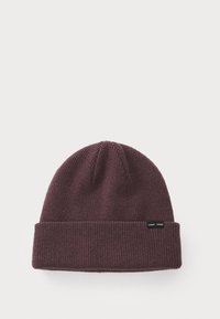 Burgundy knitted beanie with a ribbed texture, featuring a folded cuff and small label on the side. Soft material, close-fitting design.