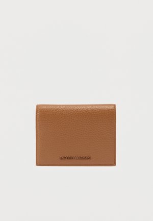 Brown leather wallet with a textured finish, featuring a embossed logo at the bottom. Compact design, rectangular shape, minimal hardware.
