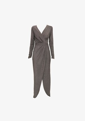 Long, fitted dress in metallic gray fabric, featuring a deep V-neck, long sleeves, a wrapped design, and an angled hem with draped texture.