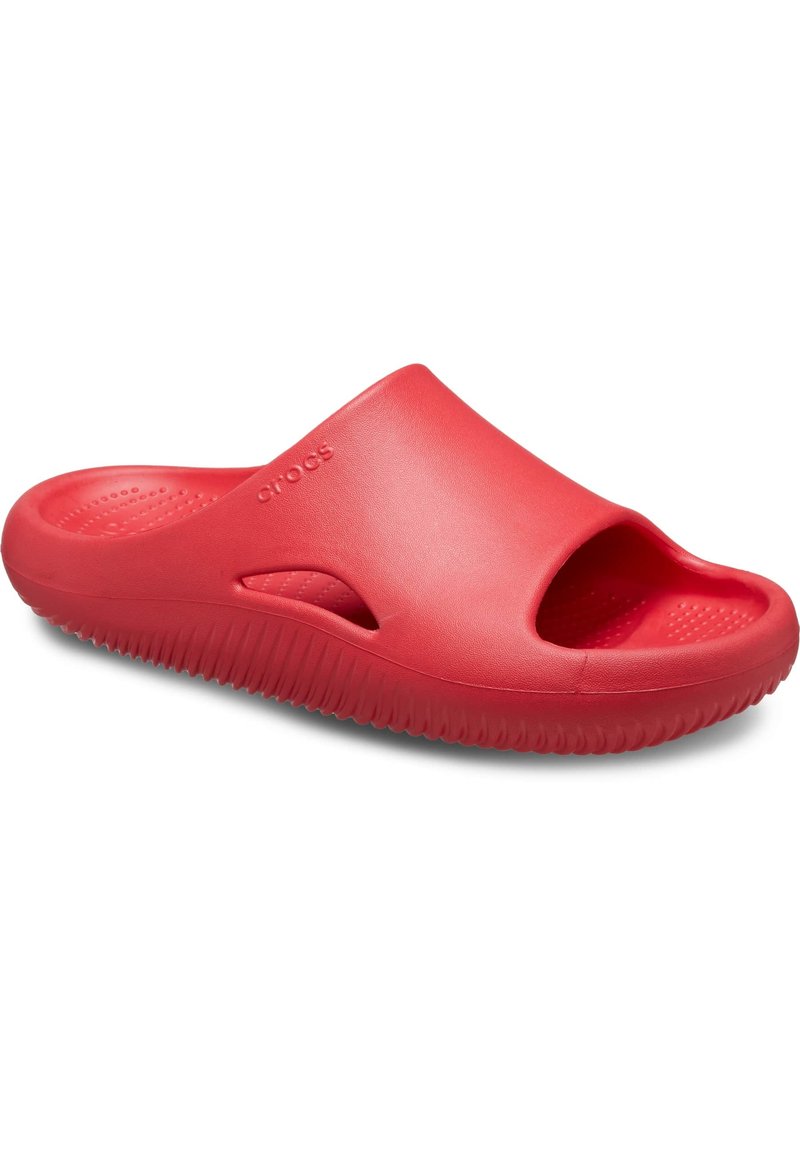 Rote Gummischlittschuhe mit weit offenem Zeh und seitlichen Ausschnitten. Sie verfügen über eine strukturierte Innensohle und eine geriffelte Außensohle für besseren Halt.