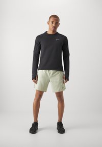 Nike Performance CHALLENGER SHORT - Sports shorts - olive aura/dark stucco/black/silver