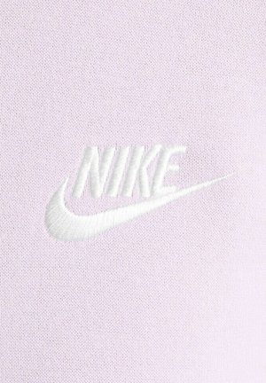 Light lavender fabric featuring a white embroidered Nike logo with a swoosh. Soft texture and smooth finish, no visible patterns or accents.