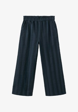 Pantalon large noir avec taille élastique et motif en dentelle rayée verticale, doté de poches latérales et d'une coupe ample.