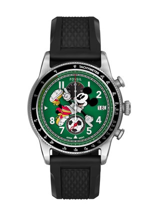 Green watch face with Mickey Mouse in soccer outfit, black textured strap, chronograph dials, date display, and tachymeter bezel.