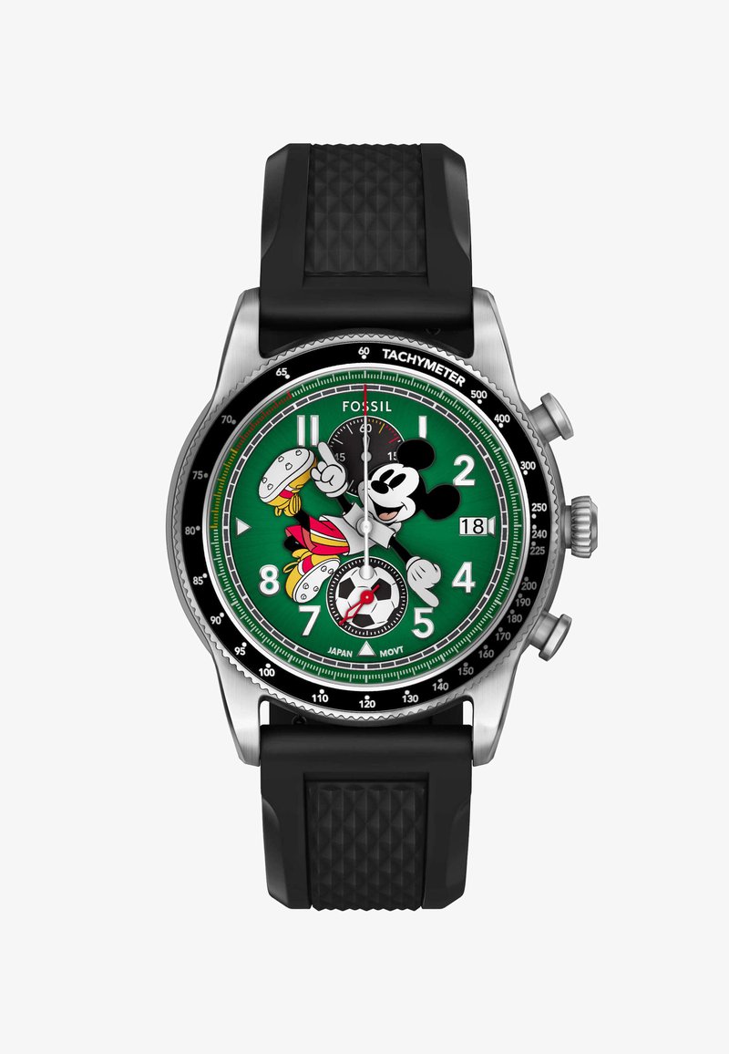 Green watch face with Mickey Mouse in soccer outfit, black textured strap, chronograph dials, date display, and tachymeter bezel.