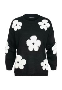 Pull en tricot noir avec de grands motifs de fleurs blanches, col rond, manches longues et bords côtelés.