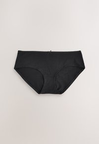 Sorte bomulds dame underbukser med lille sløjfedetalje midt på linningen, lagt fladt på en neutral baggrund.