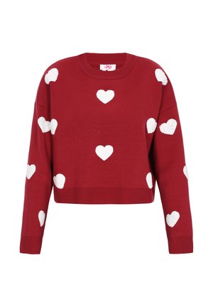 Piros kötött, rövid pulóver fehér szívmintákkal, bordázott mandzsettákkal és kerek nyakkivágással. Puha tapintású, laza illeszkedésű.