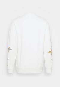 Felpa bianca con maniche lunghe. Presenta un ricamo colorato di uccelli sulle maniche e una scollatura rotonda. Tessuto morbido, vestibilità comoda.