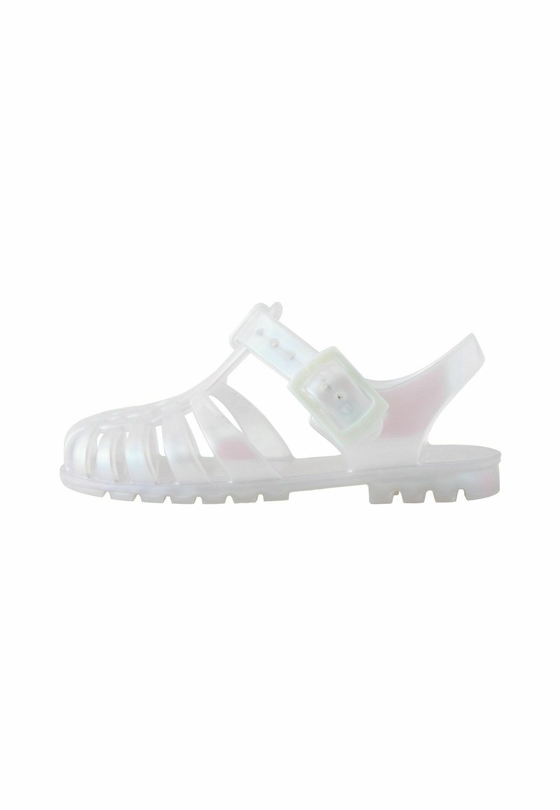 Transparent gelésandaler med utskärningsdesign, justerbart spänne, strukturerad sula och rund tå. Färgen skiftar med ljuset.