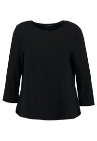 Schwarzes Langarmoberteil mit Rundhalsausschnitt, seitlichen Schlitzen und umgeschlagenen Bündchen. Hergestellt aus einem weichen, glatten Stoff mit lockerer Passform.