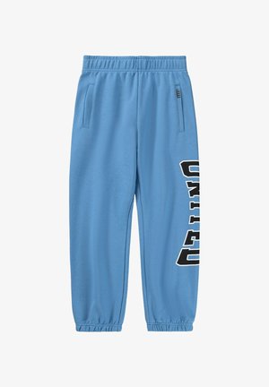 Vaaleansiniset collegehousut, joissa on joustava vyötärönauha, sivutaskut ja kapeat resorit lahkeissa. Vasemmassa lahkeessa mustalla painettu "UNITED".