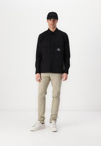 Calvin Klein MODERN SLIM - Chinos - london fog