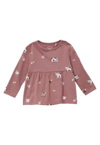 Roze lange mouwen top met een bijeen geraapt middel, voorzien van dierenillustraties en bloemaccenten. Zachte katoenen stof met knoopsluiting bij de schouder.