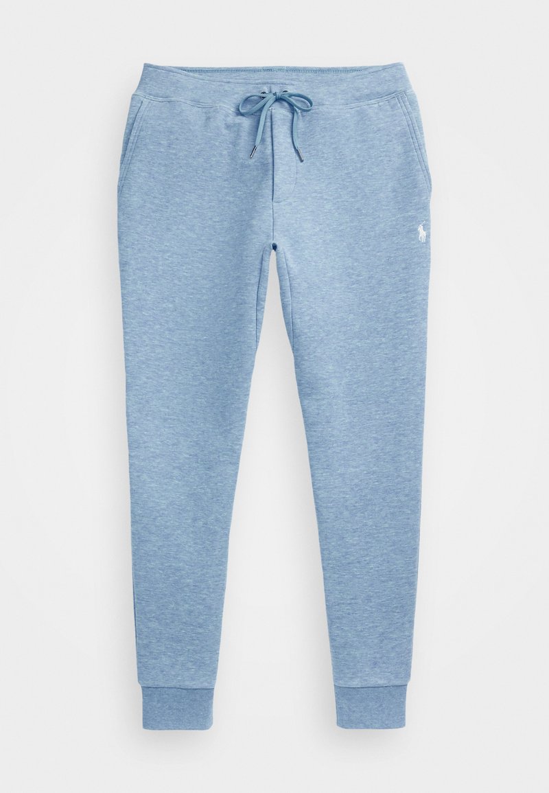 Lyseblå sweatpants lavet af blødt stof, med elastisk talje og snor, sidelommer og smalle ben.