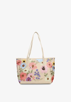Beige draagtas met twee handvatten, versierd met geborduurde bloemen in meerdere kleuren en een klein rond merkembleem aan de voorkant.