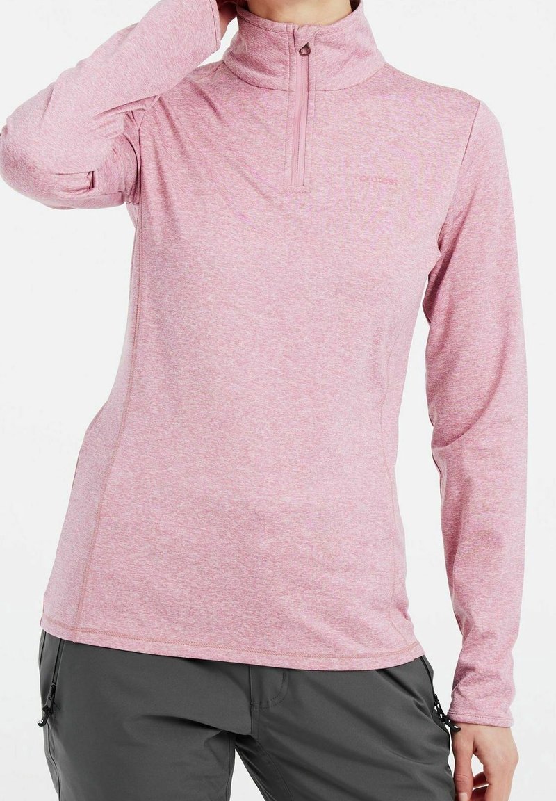 Rosa långärmad tröja med halvsidsdragkedja, tillverkad av strukturerat tyg, med ett subtilt melerat mönster och figurnära passform.