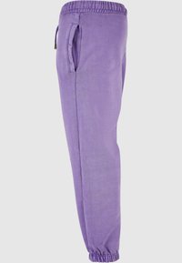 Karl Kani Jogginghose - lila