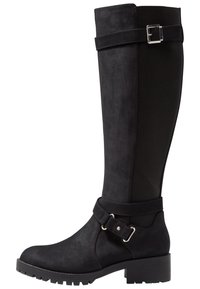 Botas negras hasta la rodilla con acabado de ante, panel lateral elástico, acento de correa y un tacón ligeramente ancho para mayor estabilidad.