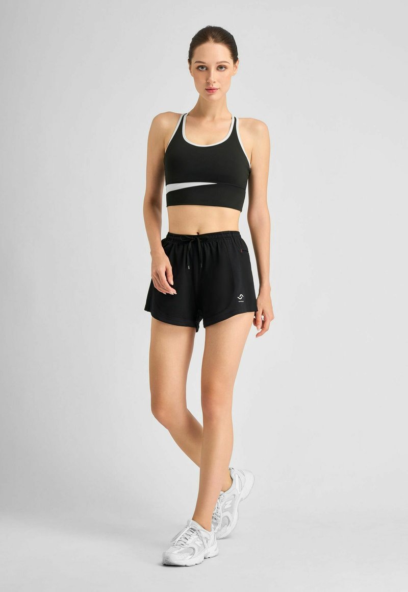 Formbelt 2-IN-1 SEITENTASCHEN - Jogginghose - schwarz