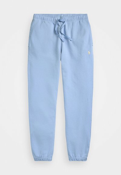 Light blue sweatpants made of soft fabric, featuring an elastic waistband with a drawstring, cuffed ankle hems, and a small logo accent.